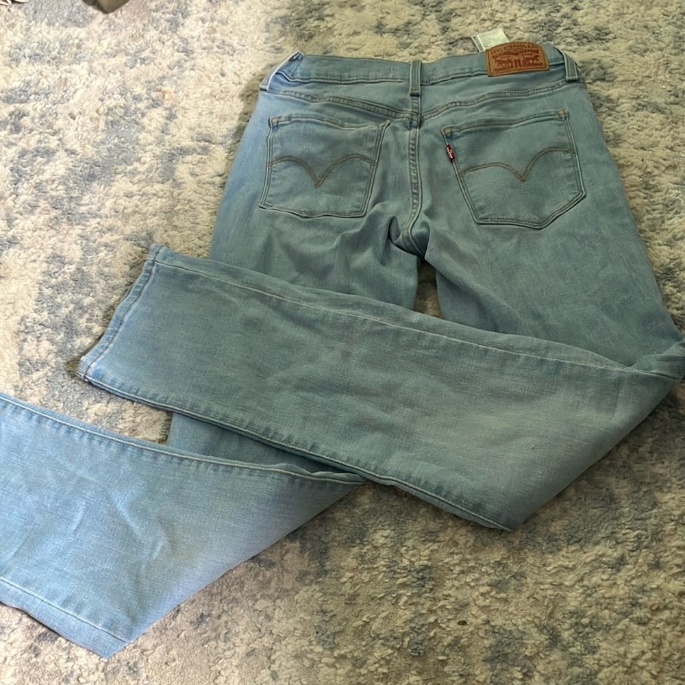 Levis 314’s straight leg denim jeans